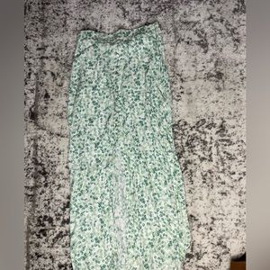 Green leaf print, maxi skirt w/ middle slit . H&M. Button detail up the front.
